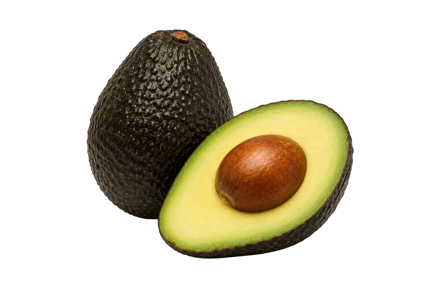 Ripe avocado with green skin and creamy flesh